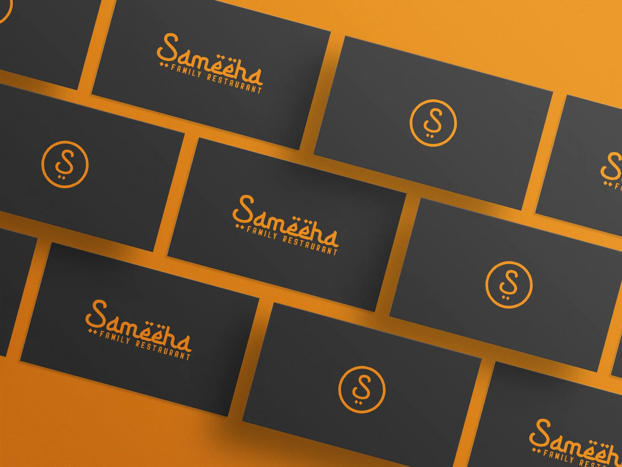 A tiled scatter of dark-grey business cards on an orange backdrop — some cards carry the "Sameeha Family Restaurant" wordmark in orange, others carry the circular "S" monogram